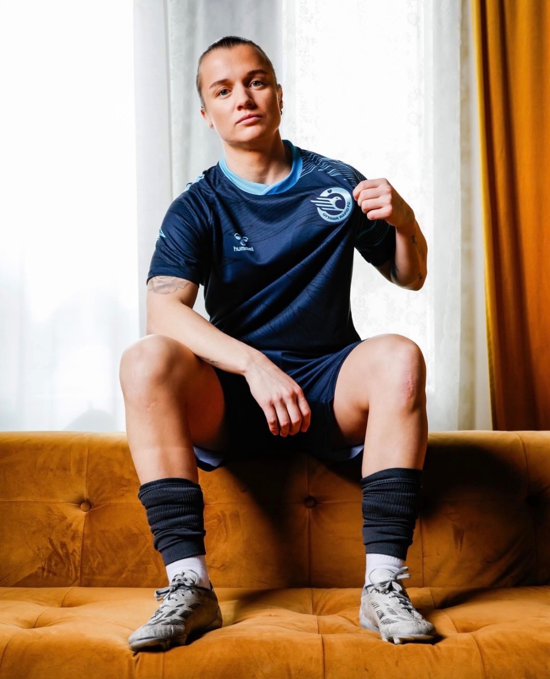 Kayla Adamek, professional footballer with Ottawa Rapid FC, in club kit